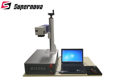 中国 20W 3Dワーク テーブルが付いている携帯用繊維レーザーの印および彫版機械 サプライヤー